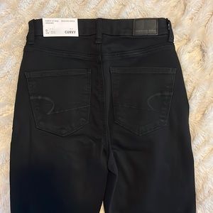 Never worn with tags - American Eagle black curvy hi-rise jegging size 0